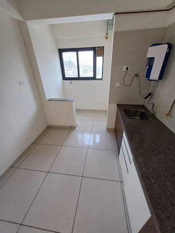 Kitchen in 1 BHK Apartment at Duville Riverdale Heights, Kharadi – for Rent