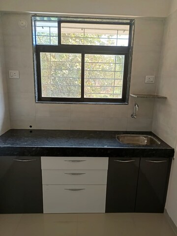 Kitchen in 2 BHK Apartment at Sai Shree Vastu Complex, Saphale – for Sale
