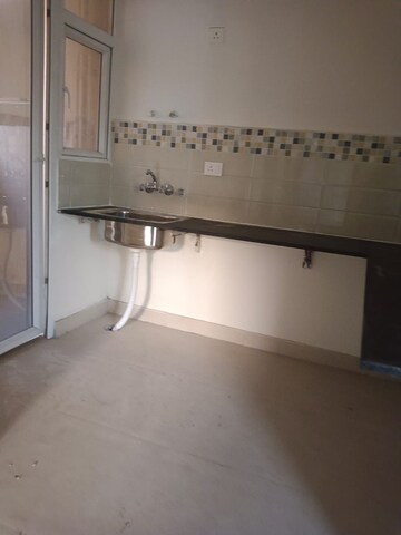 Kitchen in 2 BHK Apartment at Signature Orchard Avenue 2, Sector 93 – for Rent