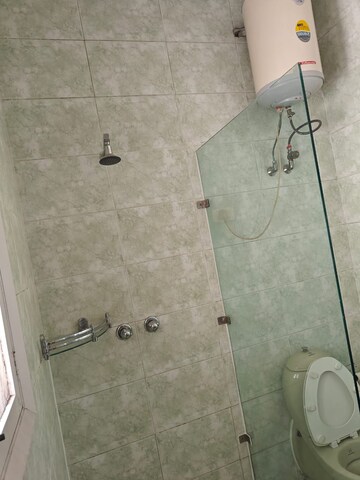 Bathroom in 2 BHK Apartment at Chanakyapuri – for Rent