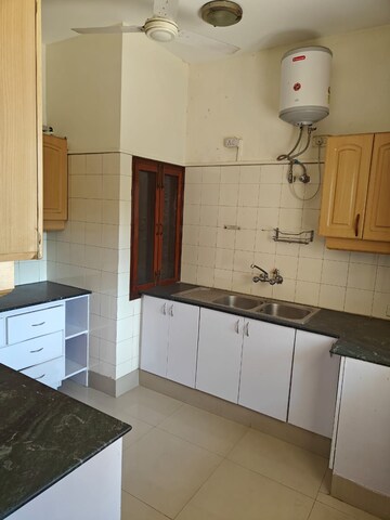 Kitchen in 2 BHK Apartment at Chanakyapuri – for Rent
