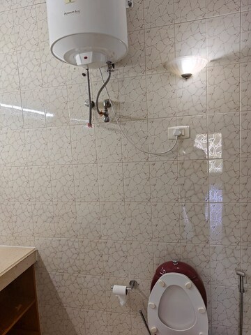 Bathroom in 2 BHK Apartment at Chanakyapuri – for Rent