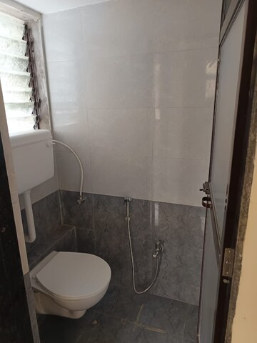 Master Bedroom in 1.5 BHK Apartment at Nirmal Sankul, Palghar – for Sale