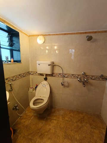 Bathroom in 2 BHK Apartment at Omkar Veda Exclusive, Parel – for Rent