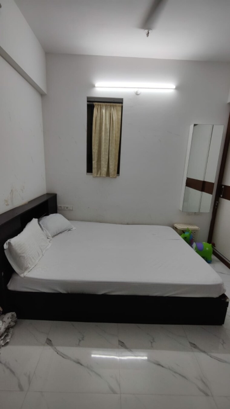 Bedroom, raymond-ten-x-vibes 2 Bedroom 636 Sq.Ft. Apartment In J K Gram Thane 8347773