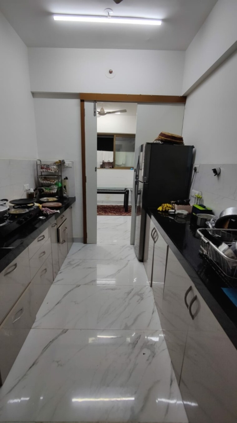 Kitchen, raymond-ten-x-vibes 2 Bedroom 636 Sq.Ft. Apartment In J K Gram Thane 8347773