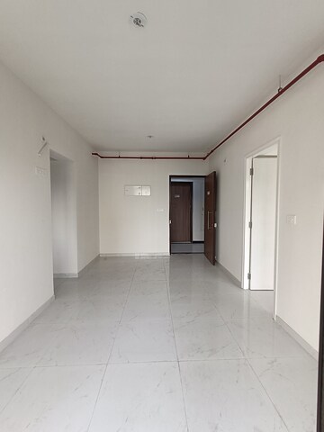 Living Room in 1.5 BHK Apartment at Runwal Gardens, Dombivli East – for Rent