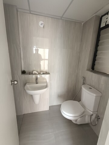 Bathroom in 1.5 BHK Apartment at Runwal Gardens, Dombivli East – for Rent