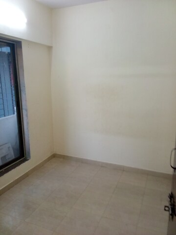 Room in 1 BHK Apartment at Shree Ganesh Ekta CHS, Goregaon West – for Rent