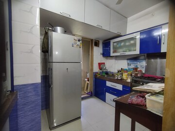 Kitchen in 3 BHK Apartment at Shanti Gardens , Mira Road – for Sale