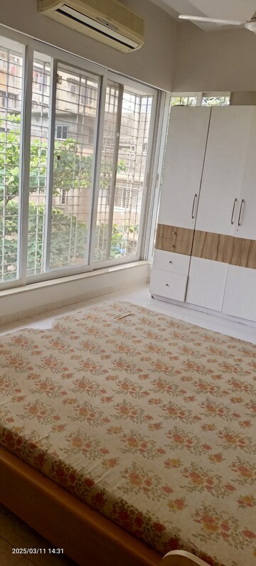 Master Bedroom in 2 BHK Apartment at Ahimsa Kutir, Goregaon West – for Rent