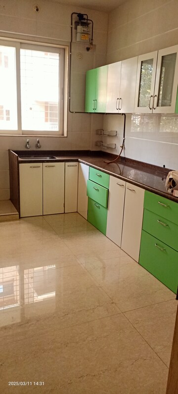 Kitchen in 2 BHK Apartment at Ahimsa Kutir, Goregaon West – for Rent