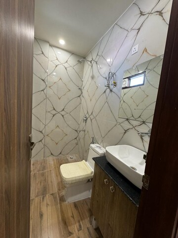 Bathroom in 2 BHK Builder Floor at Sahastradhara Road – for Sale