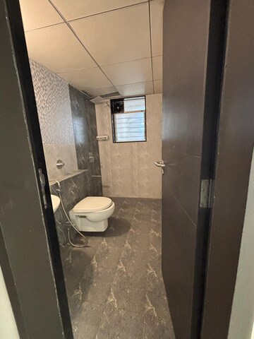 Bathroom in 2 BHK Apartment at Wadhwani Sai Paradise, Punawale – for Rent