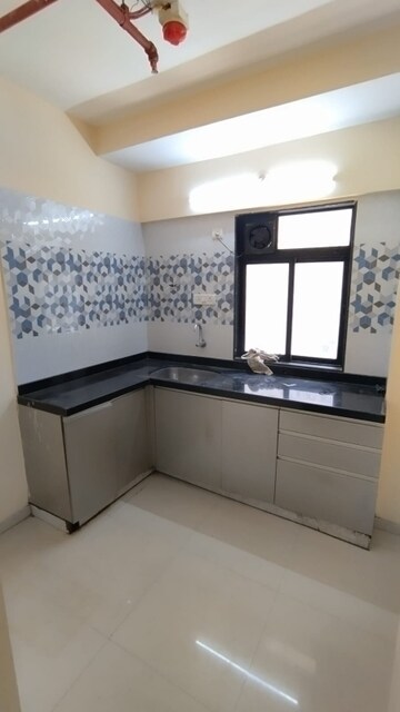Kitchen in 1 BHK Apartment at Raunak City Sector 4, Kalyan West – for Sale