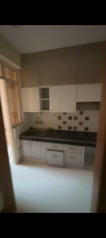 Kitchen in 2 BHK Apartment at Eureka Diya Green City, Raj Nagar Extension – for Sale