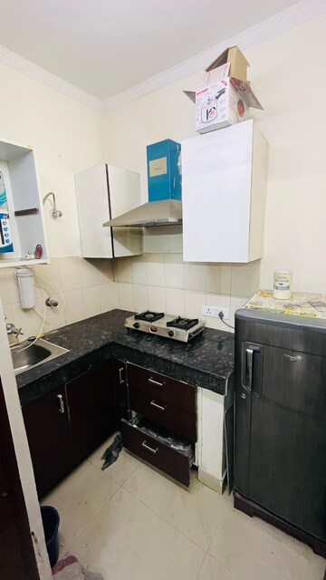 Kitchen in Studio Apartment at Maya Garden City, Lohgarh – for Rent
