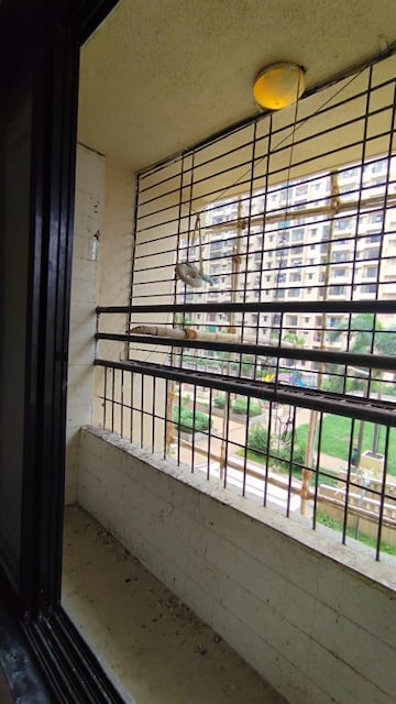 Balcony in 1 BHK Apartment at Raunak City Phase 3, Kalyan West – for Rent