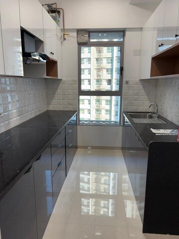 Kitchen in 2 BHK Apartment at Kalpataru Immensa, Kolshet Road – for Rent