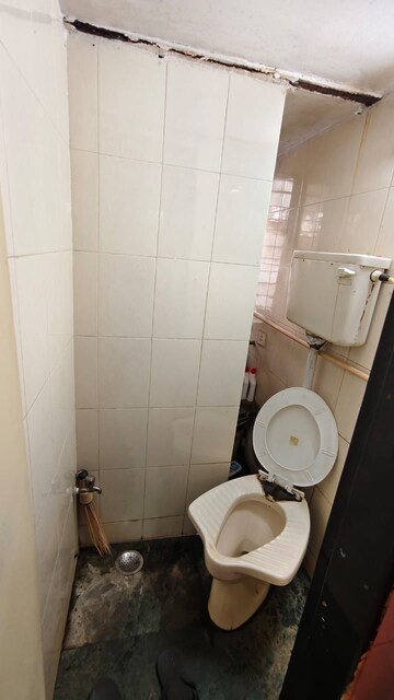 Bathroom in 2 BHK Apartment at New Kamal Kunj CHS, Malad East – for Sale