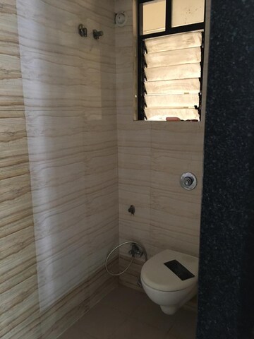 Bathroom in 2 BHK Apartment at Shivneri Tower, Brahmand – for Sale