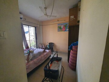 Bedroom in 3 BHK Apartment at Pramukh CHS, Kharghar Sector 21 – for Rent