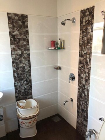 Bathroom in 3 BHK Apartment at DB Orchid Woods, Goregaon East – for Rent