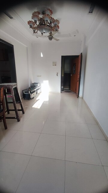 Living Room in 1 BHK Apartment at Meghmalhar CHS Ghansoli, Ghansoli – for Rent