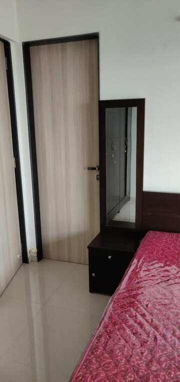 Bedroom in 2 BHK Apartment at Lalani Grandeur, Goregaon East – for Rent