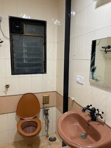 Bathroom in 2 BHK Apartment at Evershine Greens, Andheri West – for Rent