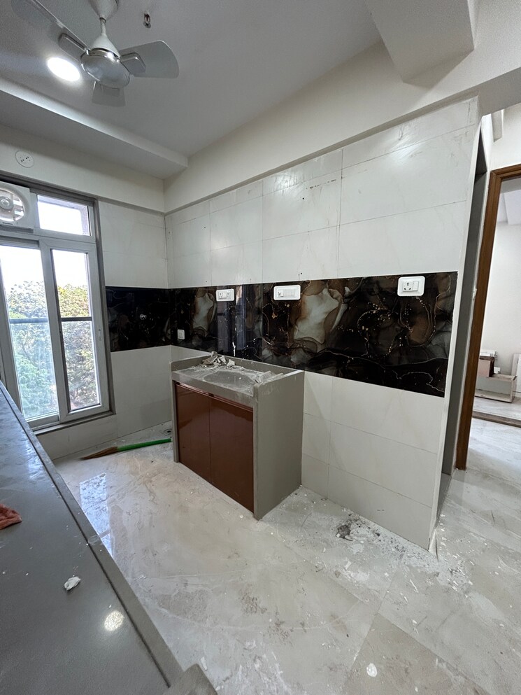 Kitchen, gurukrupa-ghanshyam 2 Bedroom 650 Sq.Ft. Apartment In Naidu Colony Mumbai 8349356