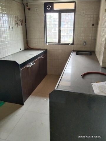 Kitchen in 1 BHK Apartment at Sethia Sea View, Goregaon West – for Sale