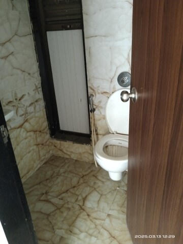 Bathroom in 1 BHK Apartment at Sethia Sea View, Goregaon West – for Sale