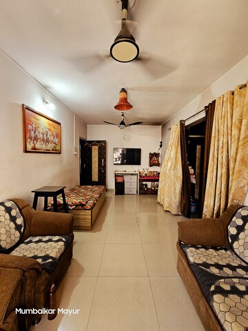Living Room in 2 BHK Apartment at Dwarka Nagari Neelkanth Park, Kalyan West – for Sale