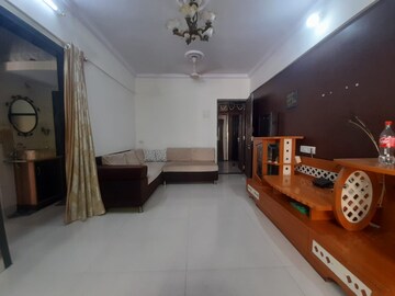 Living Room in 1 BHK Apartment at Mahavir Umang Building, Uthalsar – for Rent