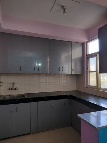 Kitchen in 2 BHK Apartment at Shree Vardhman Green Court, Sector 90 – for Rent