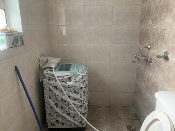 Bathroom in 3 BHK Builder Floor at Guru Nanak Enclave, Dhakoli Village – for Rent