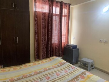 Bedroom in 3 BHK Builder Floor at Guru Nanak Enclave, Dhakoli Village – for Rent