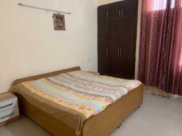 Bedroom in 3 BHK Builder Floor at Guru Nanak Enclave, Dhakoli Village – for Rent