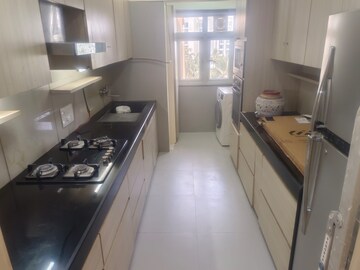 Kitchen in 2 BHK Apartment at Anmol Society, Marol – for Rent
