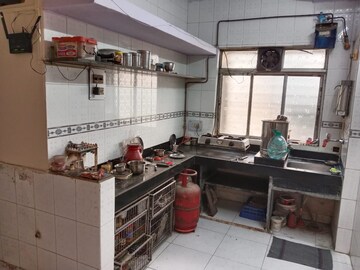 Kitchen in 2 BHK Apartment at Manas Vastu Apartment, Naupada – for Rent