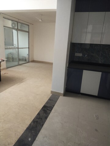 Kitchen in 2 BHK Apartment at Ajnara Le Garden, Sector 16b Greater Noida – for Rent