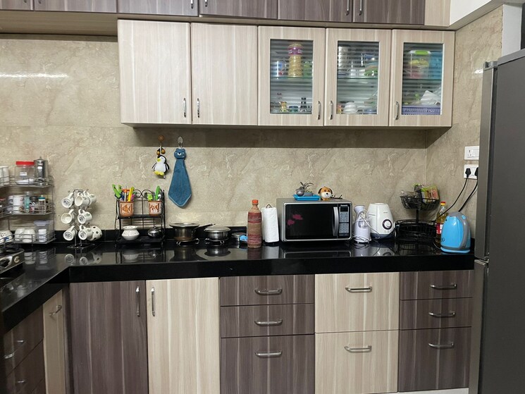 Kitchen, bhandari-7-plumeria-drive 2 Bedroom 920 Sq.Ft. Apartment In Tathawade Pune 8349872