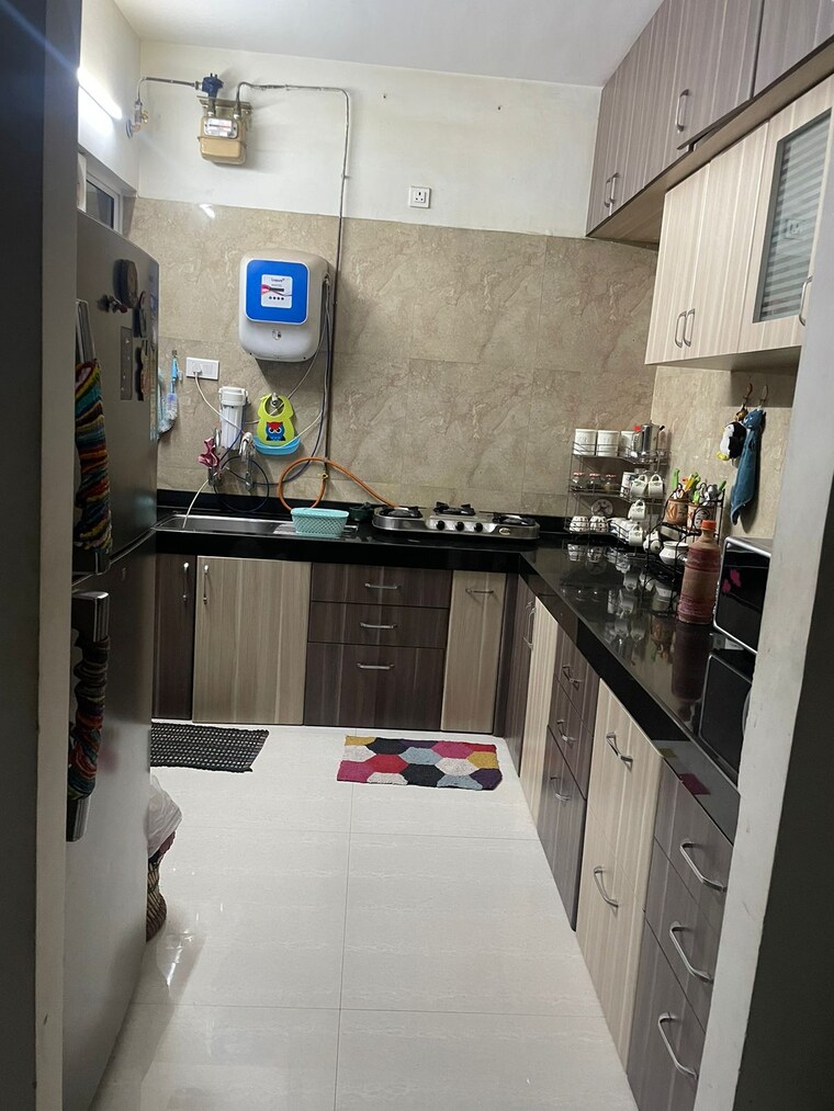 Kitchen, bhandari-7-plumeria-drive 2 Bedroom 920 Sq.Ft. Apartment In Tathawade Pune 8349872