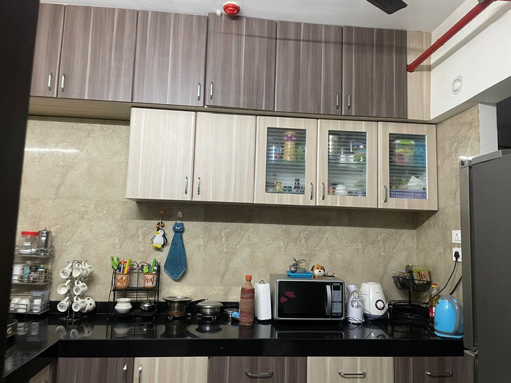 Kitchen, bhandari-7-plumeria-drive 2 Bedroom 920 Sq.Ft. Apartment In Tathawade Pune 8349872