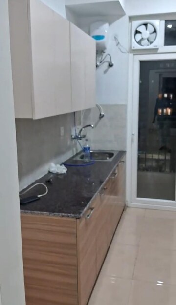 Kitchen in 3 BHK Apartment at ATS Nobility, Sector 4, Greater Noida – for Rent