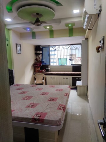 Bedroom in 2.5 BHK Apartment at Osho Kabir CHS, New Panvel – for Rent