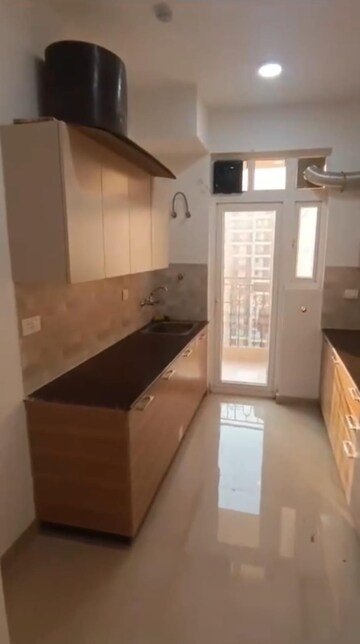Kitchen in 3 BHK Apartment at ATS Nobility, Sector 4, Greater Noida – for Rent