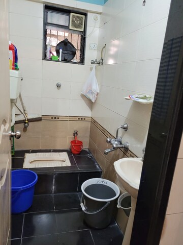 Bathroom in 2 BHK Apartment at Seawoods – for Sale