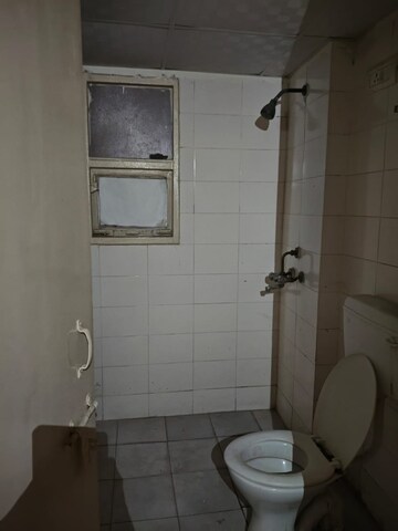 Bathroom in 2 BHK Apartment at Adore Happy Homes, Sector 86 – for Rent
